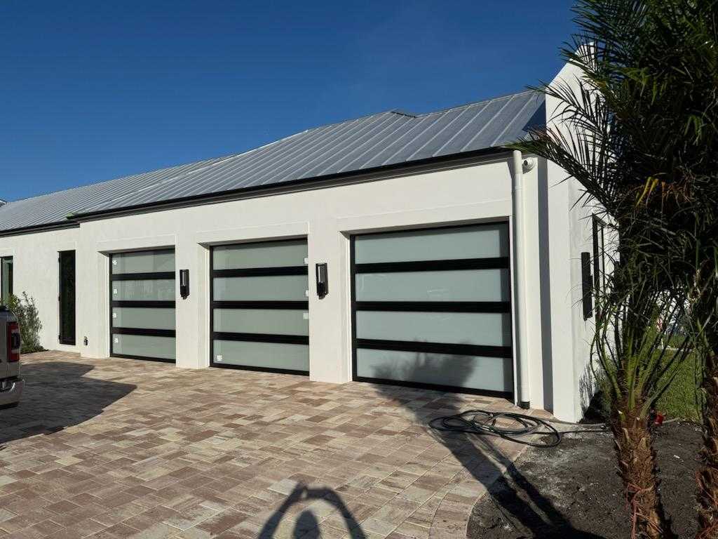 hurricane rated impact garage doors, hurricane impact garage doors, garage impact doors florida